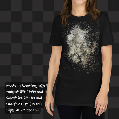 Person wearing a black tee with skull graphic surrounded and overlaid with paint splatter in camouflage colors