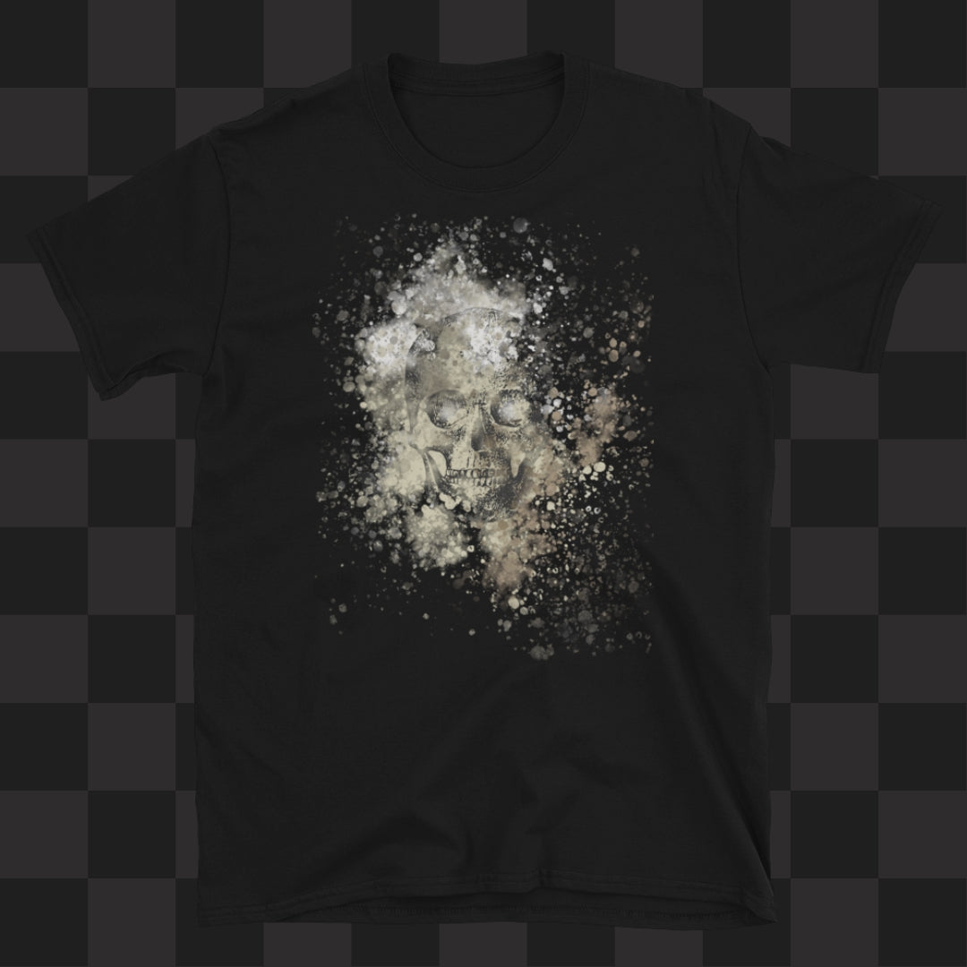 A black tee with skull graphic surrounded and overlaid with paint splatter in camouflage colors