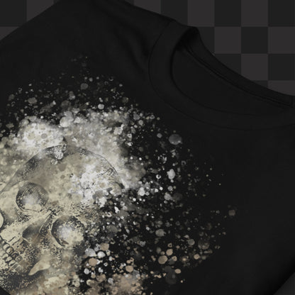 A black tee with skull graphic surrounded and overlaid with paint splatter in camouflage colors