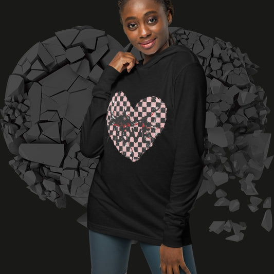 Person wearing a hooded long sleeve tee with a broken distressed emo heart