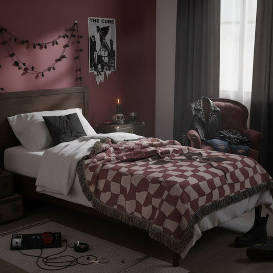 a woven blanket featuring dark romantic alt distorted checkerboard patterns and a deep red soulful rose used as bed throw