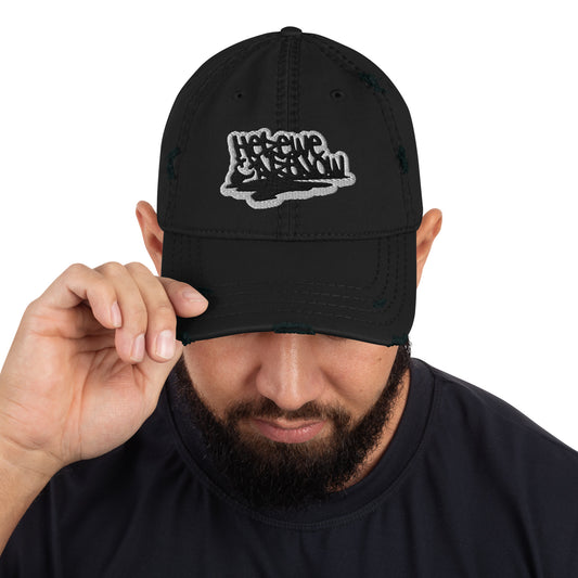 distressed cap with grunge quote embroidery "here we are now"