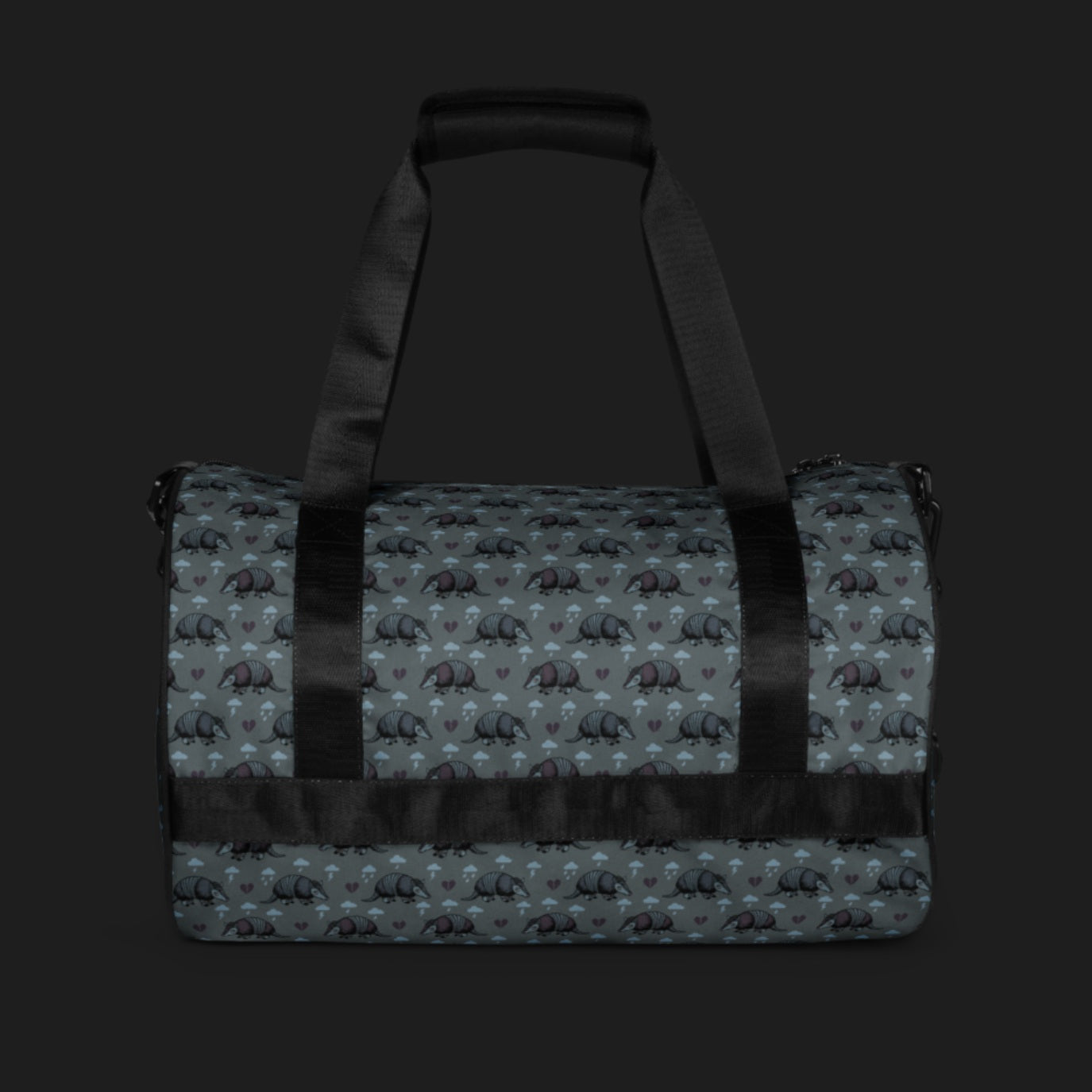 a duffel gym bag with an emo armadillo pattern with broken hearts and storm clouds