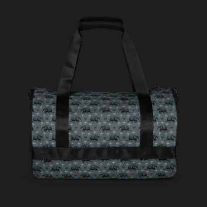 a duffel gym bag with an emo armadillo pattern with broken hearts and storm clouds