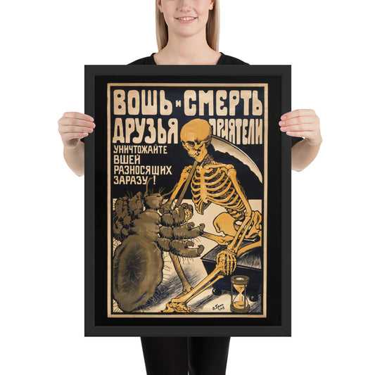 Woman holding a framed vintage poster of the Russian "The typhus louse shaking hands with Death"