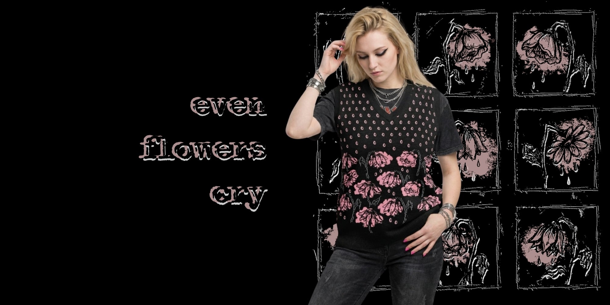Person wearing a black knitted vest with crying pink flowers and teardrops