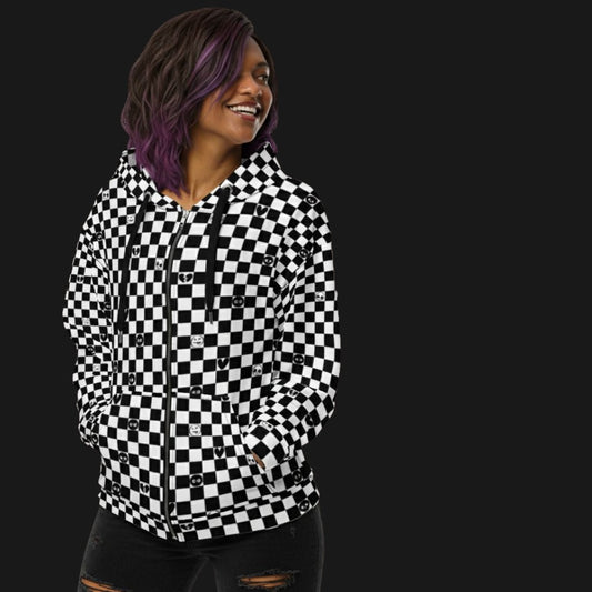 person wearing a zip hoodie with a checkered pattern with small emo symbols