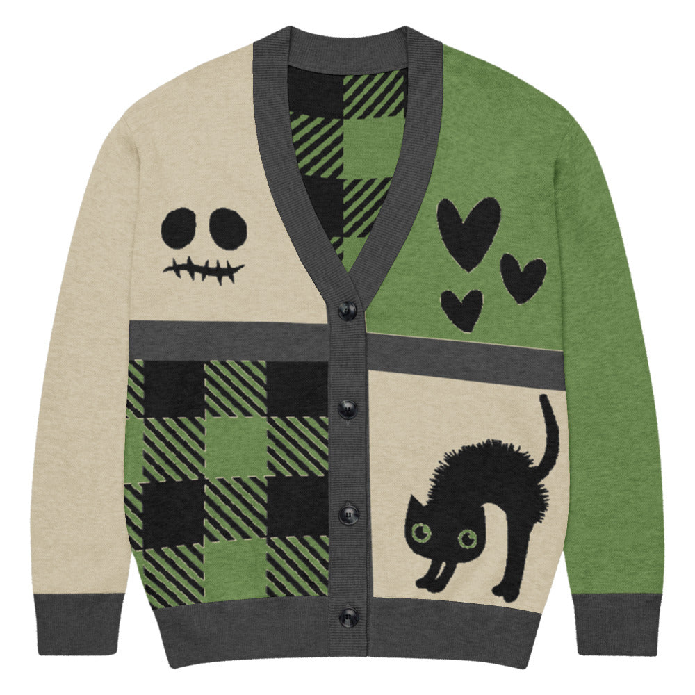 a knitted cardigan with patchwork like design, plaid, hearts, spooky eyes and a cat