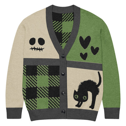 a knitted cardigan with patchwork like design, plaid, hearts, spooky eyes and a cat