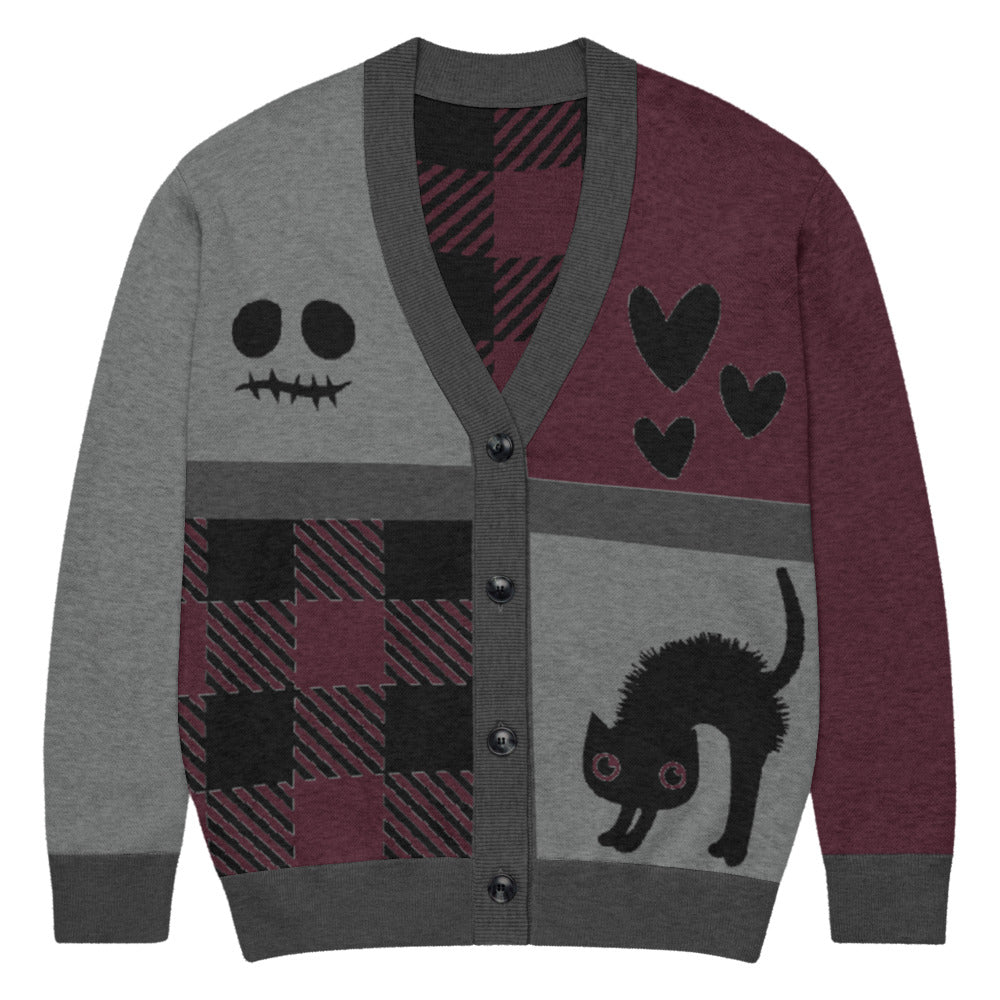 a knitted cardigan with patchwork like design, plaid, hearts, spooky eyes and a cat