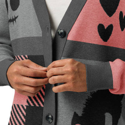 a knitted cardigan with patchwork like design, plaid, hearts, spooky eyes and a cat