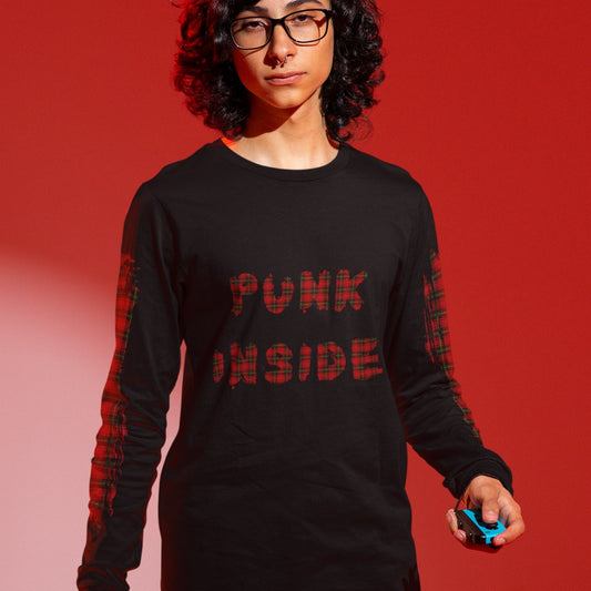 Person wearing a black long-sleeve shirt with 'PUNK INSIDE' text and sleeve plaid prints, on a red background