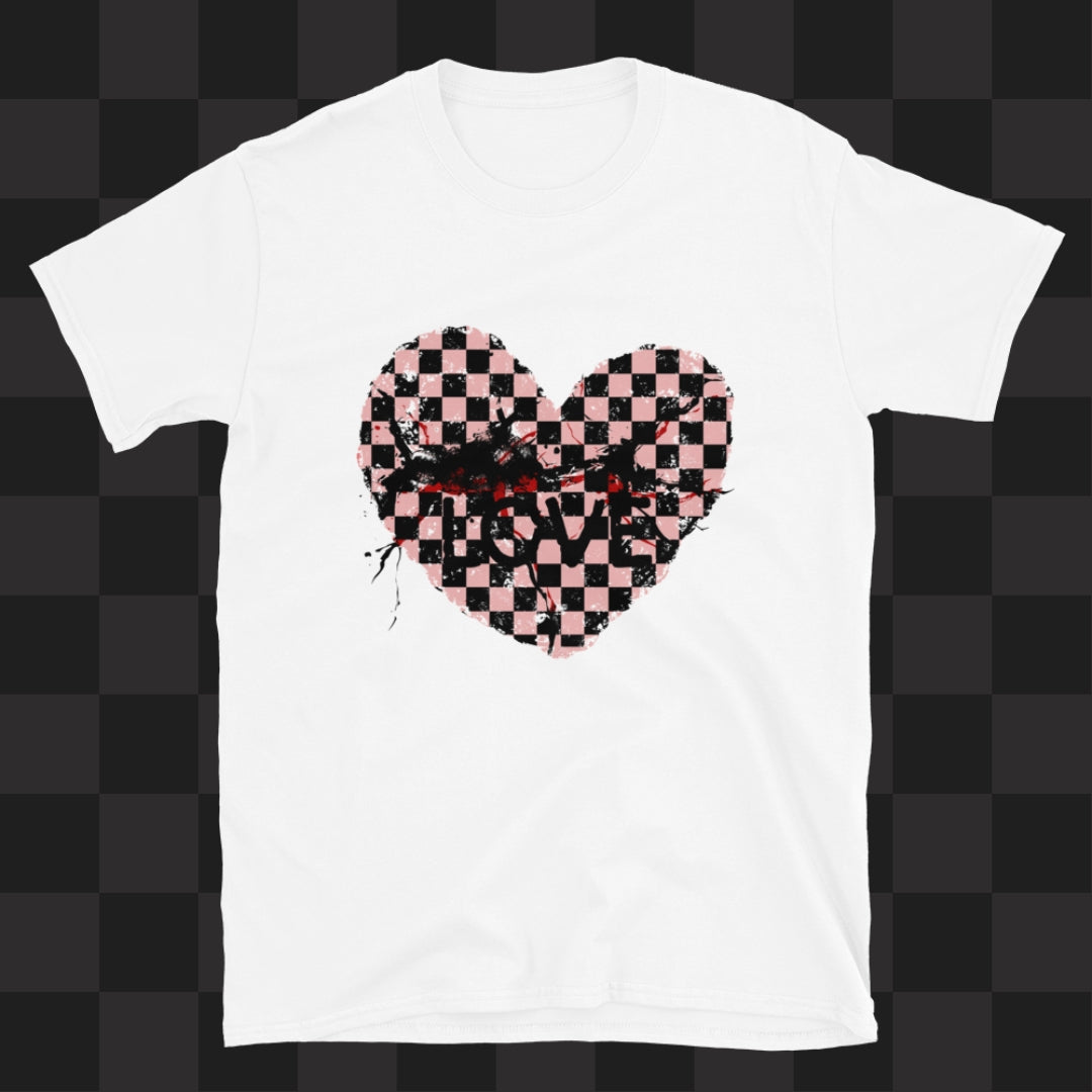 A white gildan 64000 t-shirt with a pink and black cracked distressed checkered heart and the text love partly obscured.