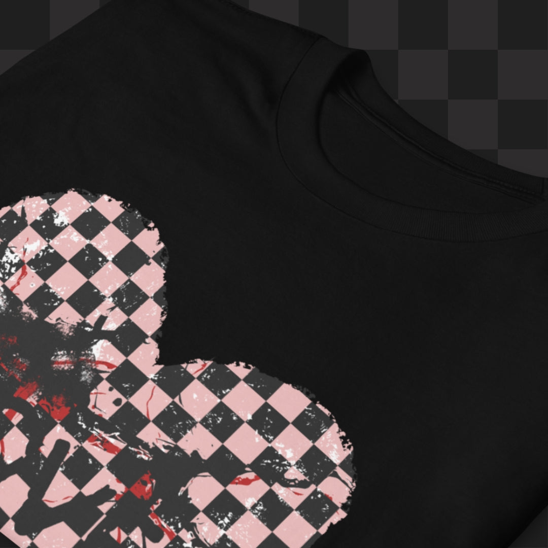 A black gildan 64000 t-shirt with a pink and black cracked distressed checkered heart and the text love partly obscured.