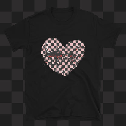 A black gildan 64000 t-shirt with a pink and black cracked distressed checkered heart and the text love partly obscured.