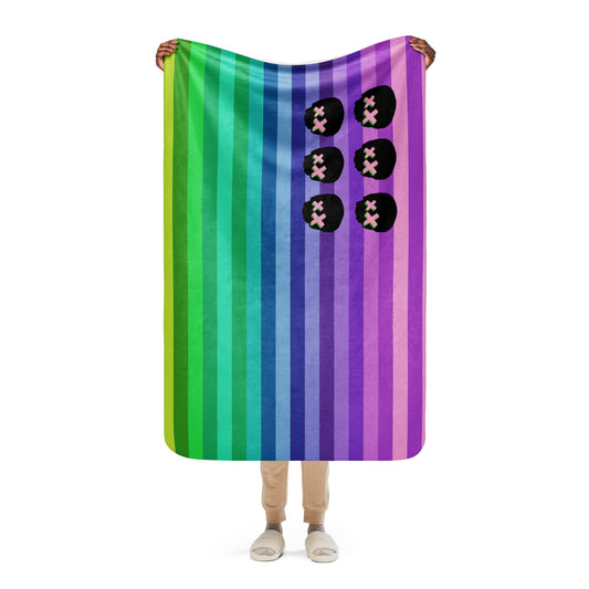 a fleece sherpa blanket featuring skulls and stripes in the format on the American flag
