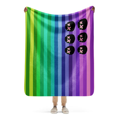 a fleece sherpa blanket featuring skulls and stripes in the format on the American flag
