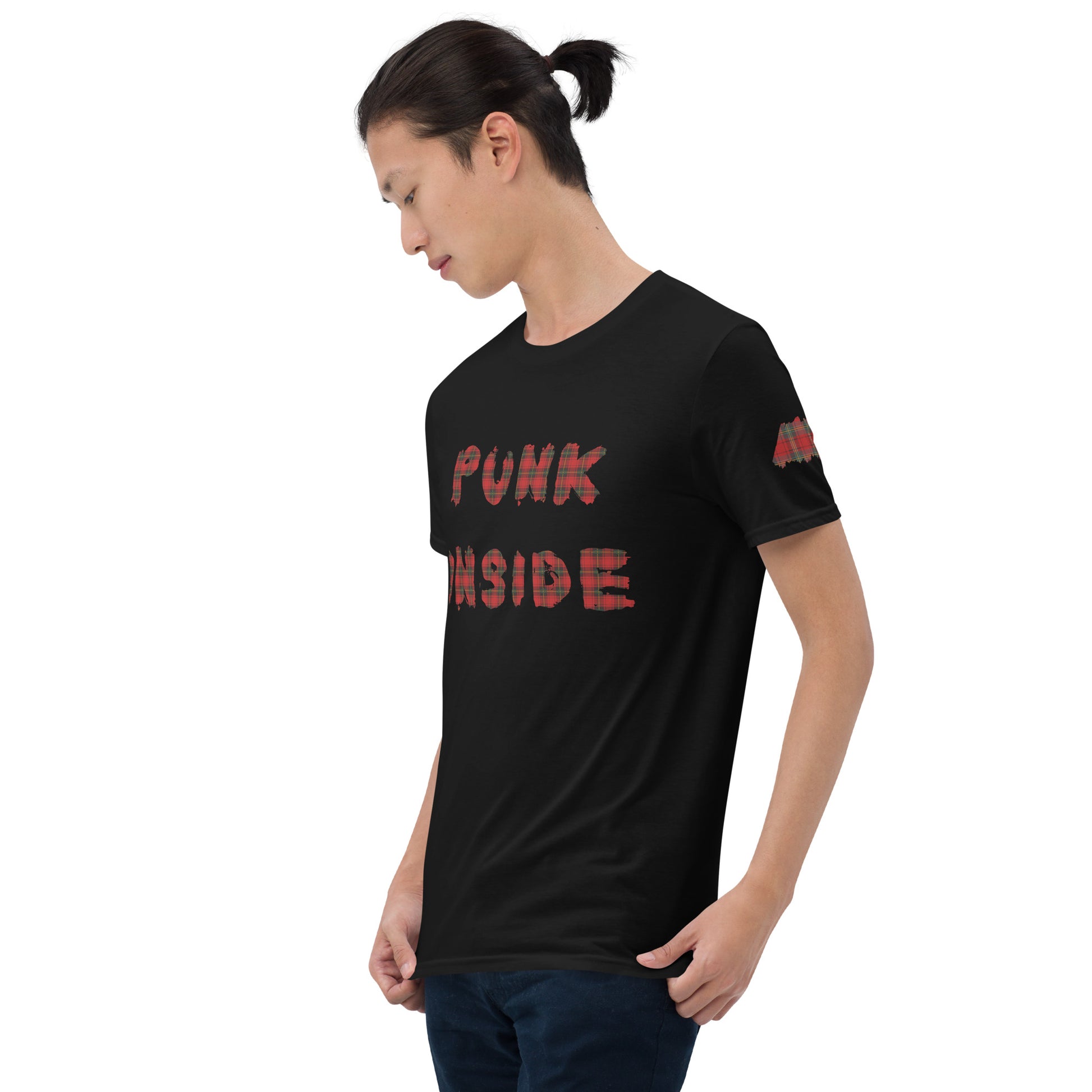 man wearing a black alt style t-shirt with front text "punk inside" in red punk plaid letters and red plaid patterns on sleeves