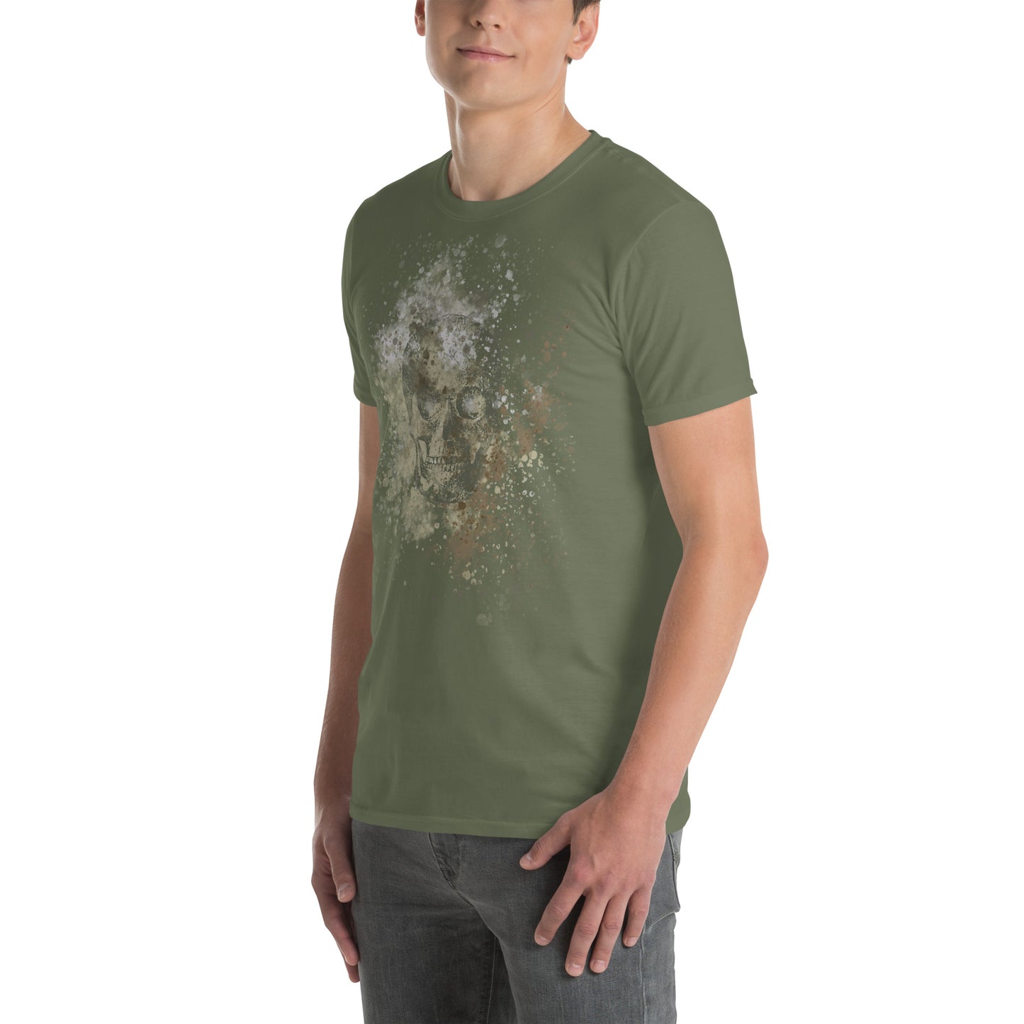 man wearing a tee with subtle skull graphic surrounded and overlaid with paint splatter in camouflage colors on military green