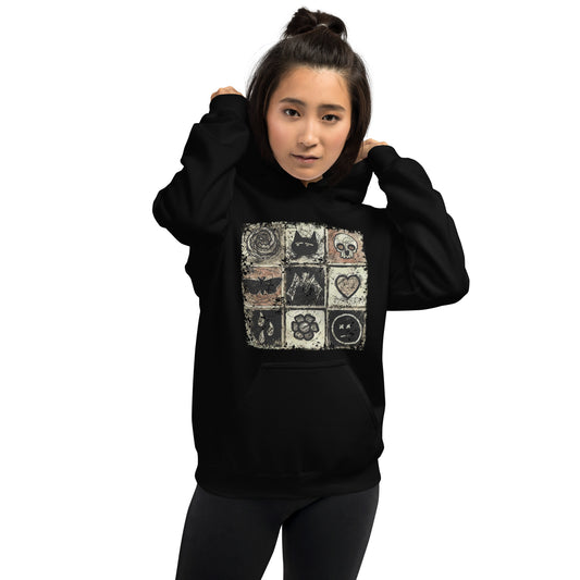 a hoodie with a dark scribble of emo symbols