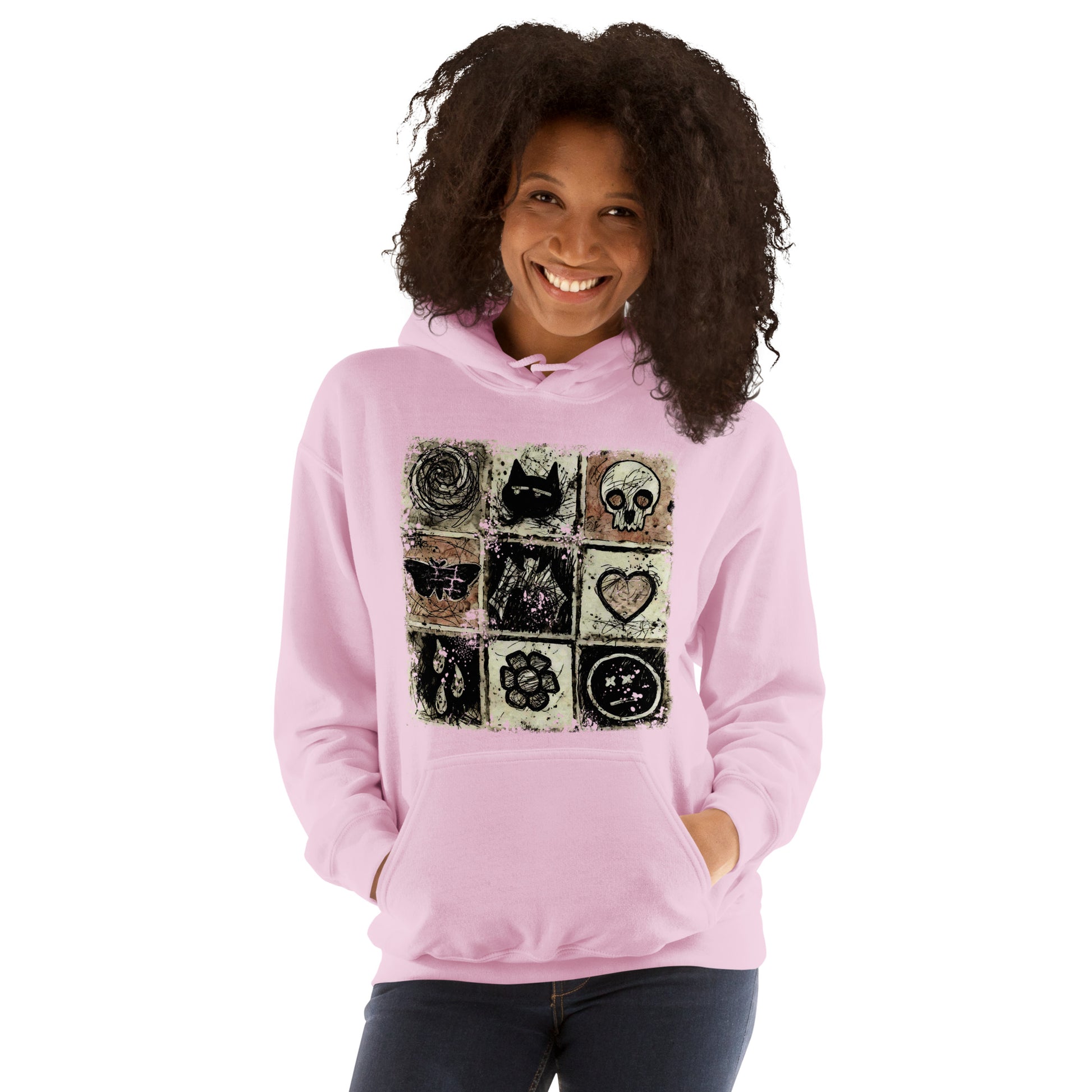 a hoodie with a dark scribble of emo symbols