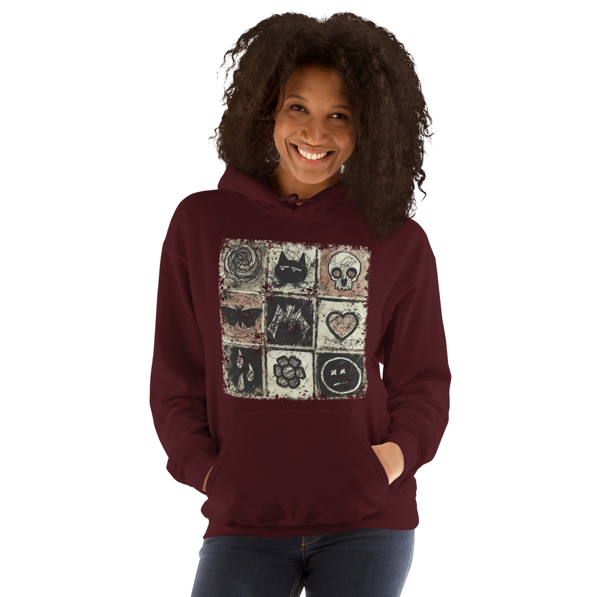 a hoodie with a dark scribble of emo symbols