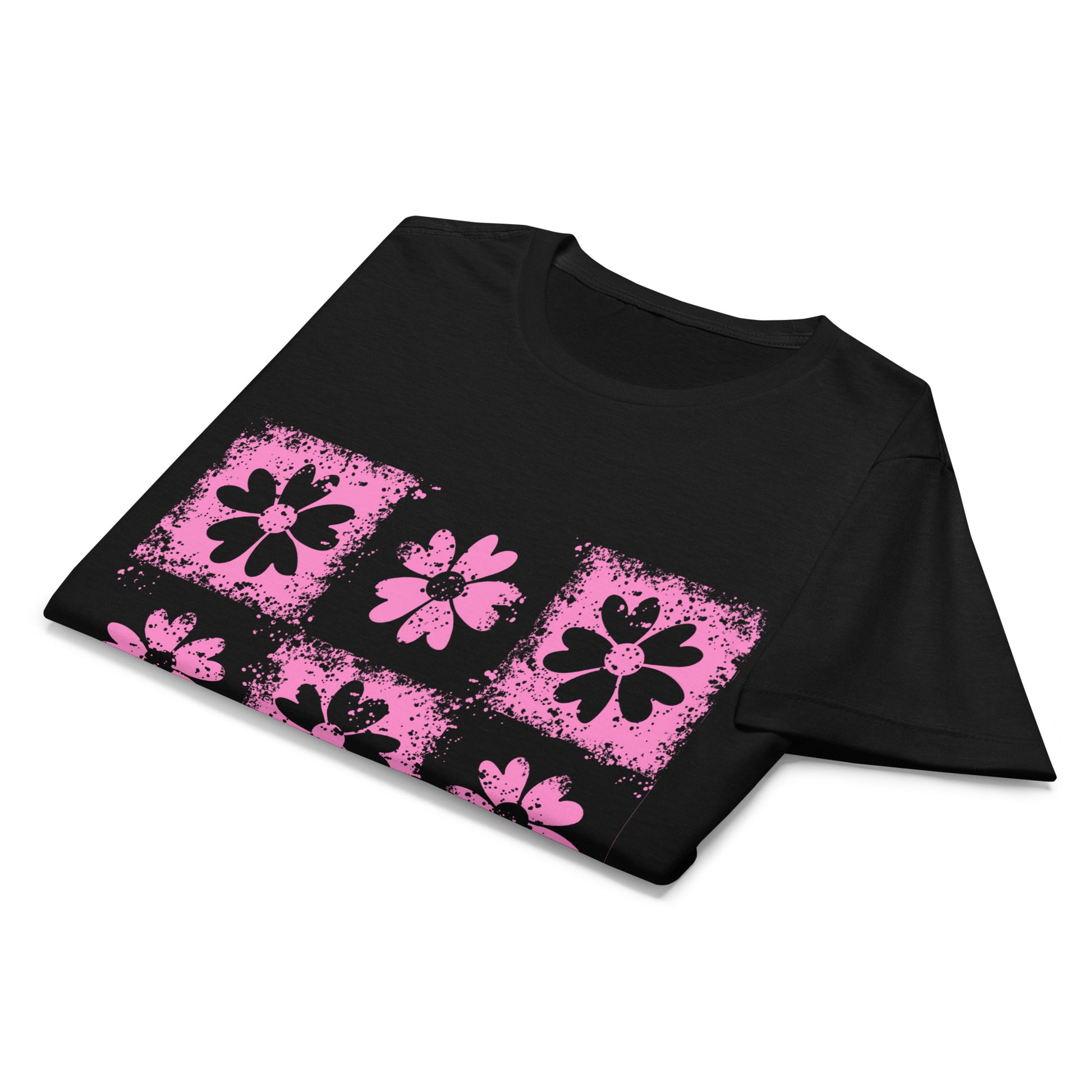 detail of a black t-shirt with emo vibe distressed pink floral pattern grid